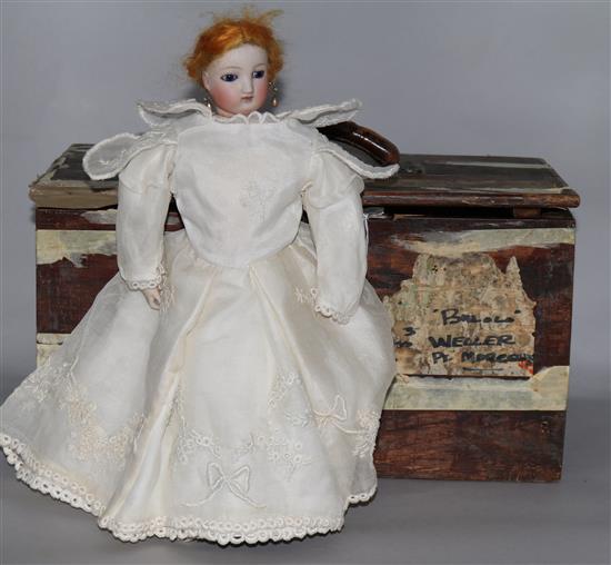 A Continental bisque head automaton doll, late 19th century